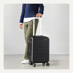 حقيبة سفر صلبة قابلة للحمل بعجلات - 21 بوصة (55 سم)، المادة: ABS، لون أسود حقيبة سفر صلبة قابلة للحمل بعجلات - 21 بوصة (55 سم)، المادة: ABS، لون أسود