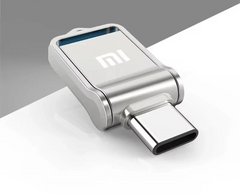 Xiaomi USB drive with 1TB capacity on a gray background Xiaomi USB drive with 1TB capacity on a gray background