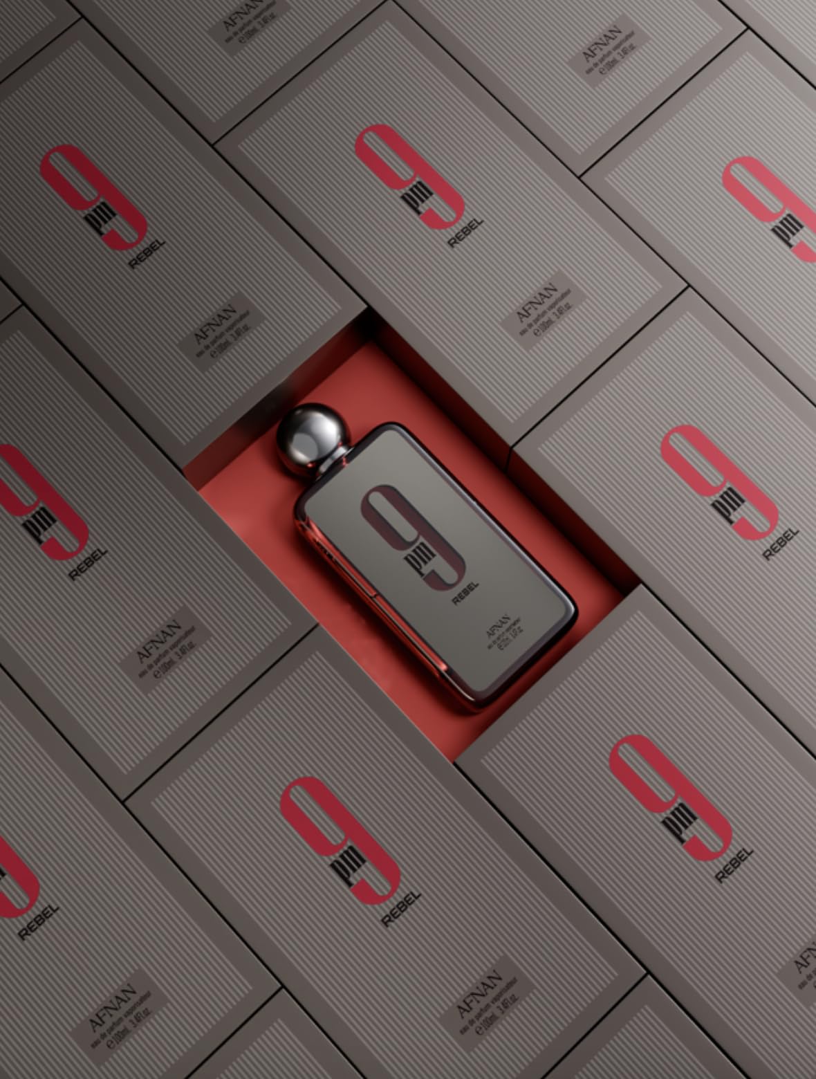 Afnan 9 PM Rebel perfume bottle surrounded by multiple boxed products from the Afnan Store Afnan 9 PM Rebel perfume bottle surrounded by multiple boxed products from the Afnan Store