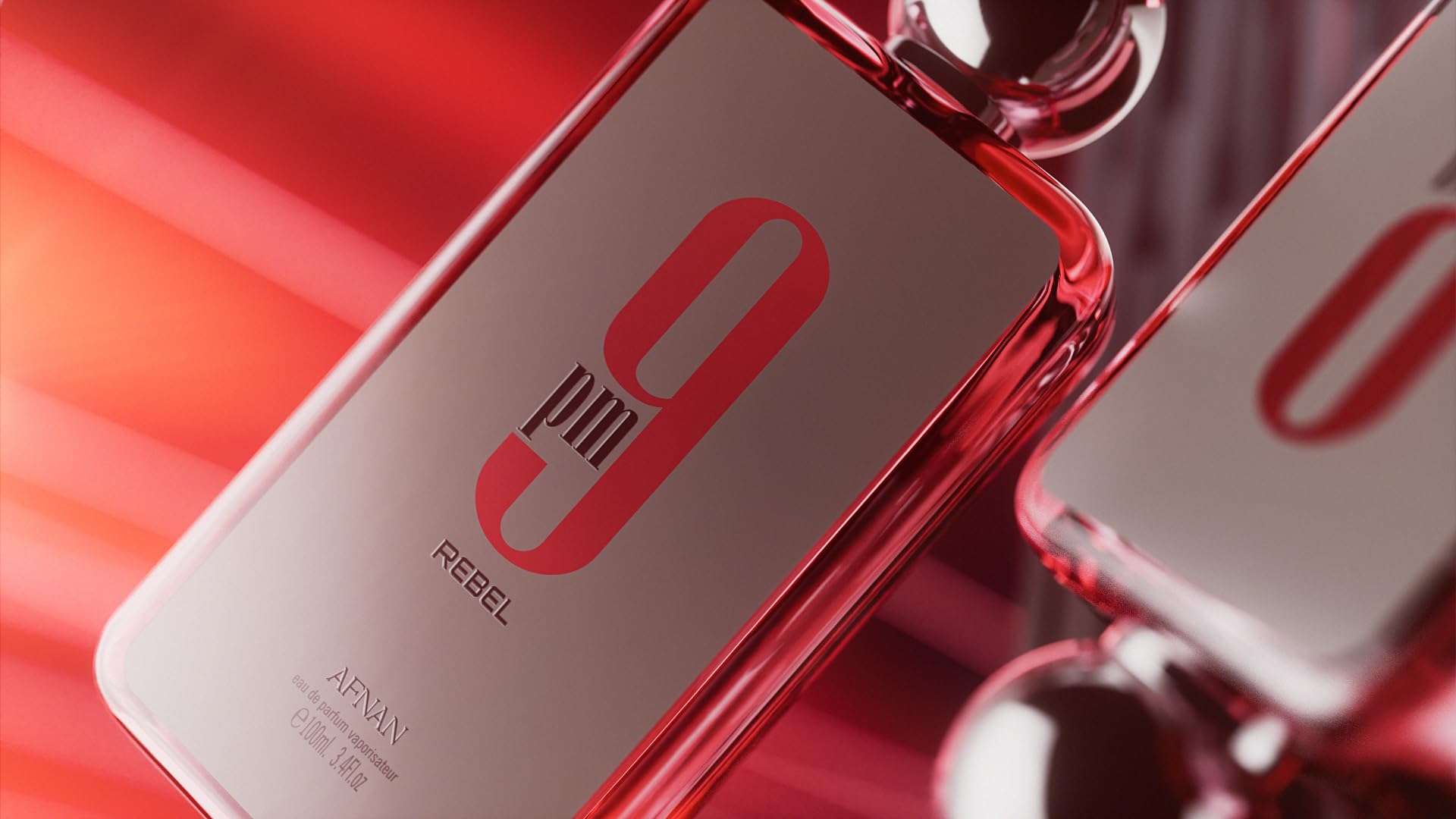 Afnan 9 PM Rebel perfume bottle with sleek red and silver design on reflective surface Afnan 9 PM Rebel perfume bottle with sleek red and silver design on reflective surface