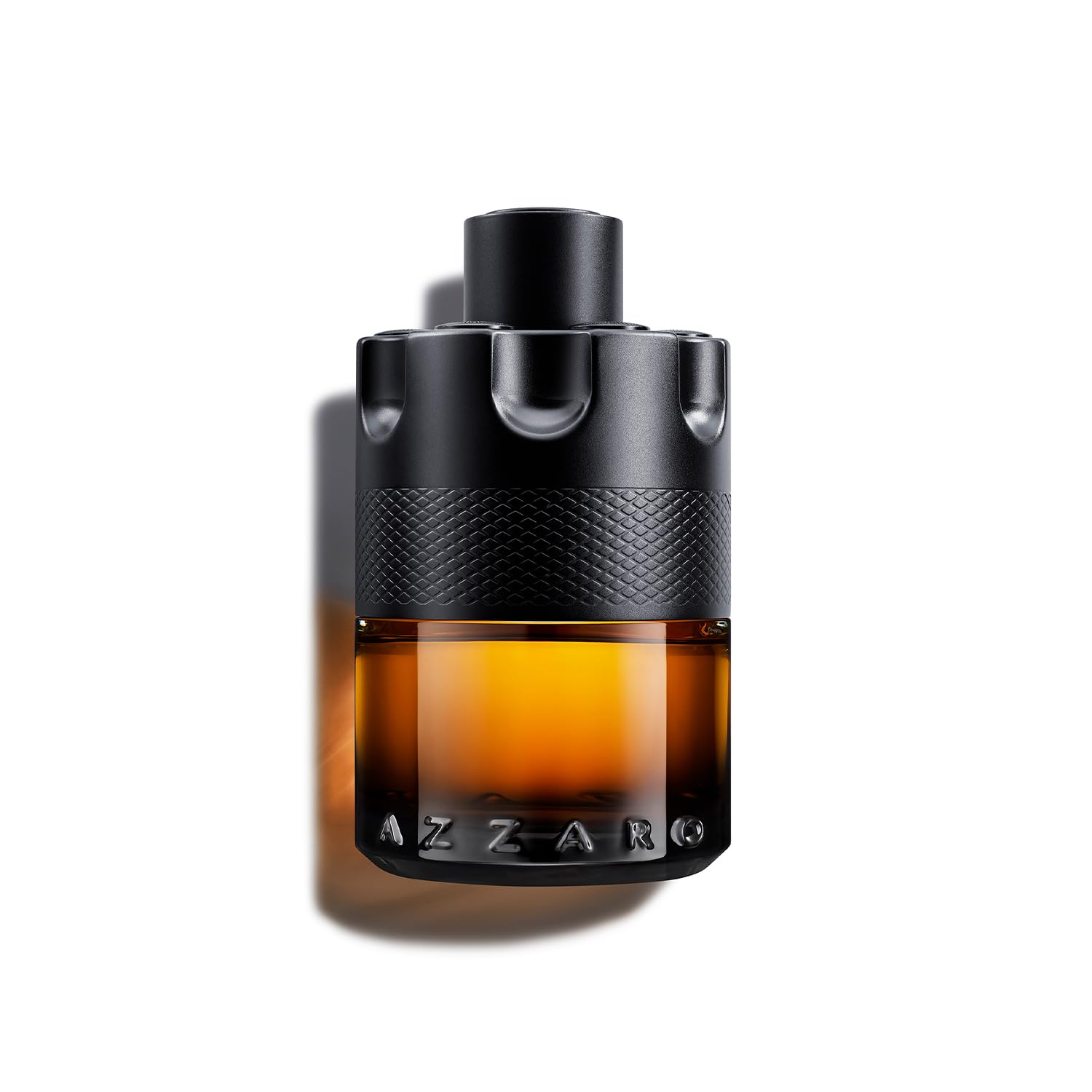 Azzaro The Most Wanted Parfum for men amber and black bottle with textured design Azzaro The Most Wanted Parfum for men amber and black bottle with textured design
