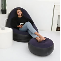 Huitich indoor outdoor inflatable chair in black with matching inflatable footrest and woman relaxing Huitich indoor outdoor inflatable chair in black with matching inflatable footrest and woman relaxing