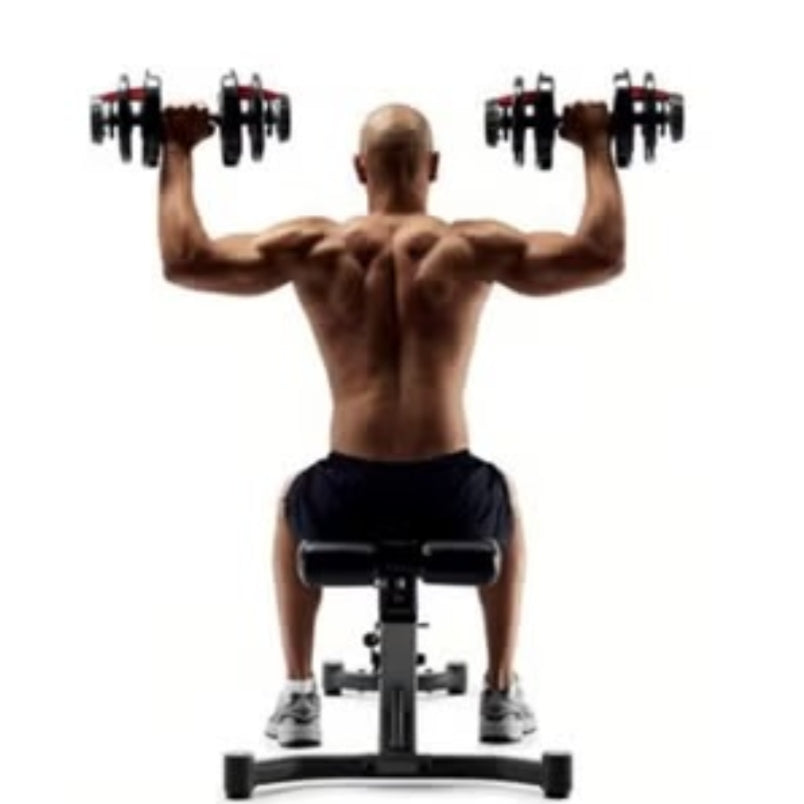 Man exercising with Huitich 24kg adjustable dumbbell set seated on bench for strength training Man exercising with Huitich 24kg adjustable dumbbell set seated on bench for strength training