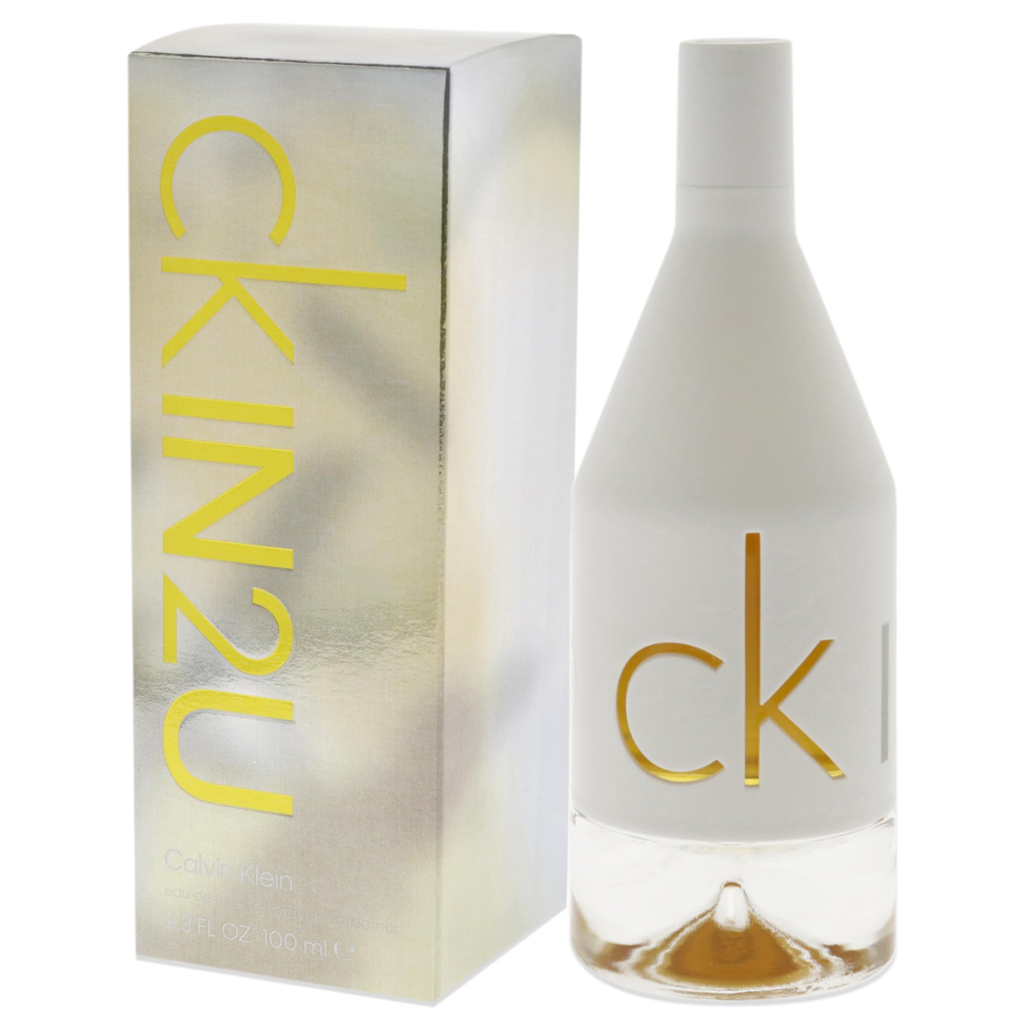 Calvin Klein CK IN2U perfume for women bottle and shiny silver box with yellow text Calvin Klein CK IN2U perfume for women bottle and shiny silver box with yellow text
