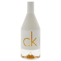 Calvin Klein CK IN2U perfume for women in minimalist white bottle with clear base Calvin Klein CK IN2U perfume for women in minimalist white bottle with clear base