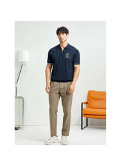 Huitich casual half zipper polo shirt in navy blue worn by man with tan pants and white sneakers Huitich casual half zipper polo shirt in navy blue worn by man with tan pants and white sneakers