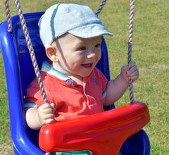 Huitich comfortable baby swing for home featuring a blue seat with red safety bar holding a happy baby outdoors Huitich comfortable baby swing for home featuring a blue seat with red safety bar holding a happy baby outdoors