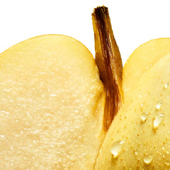 Close-up of fresh yellow pear slices with water droplets showcasing natural texture for Davidoff Cool Water Sea Rose for women Close-up of fresh yellow pear slices with water droplets showcasing natural texture for Davidoff Cool Water Sea Rose for women