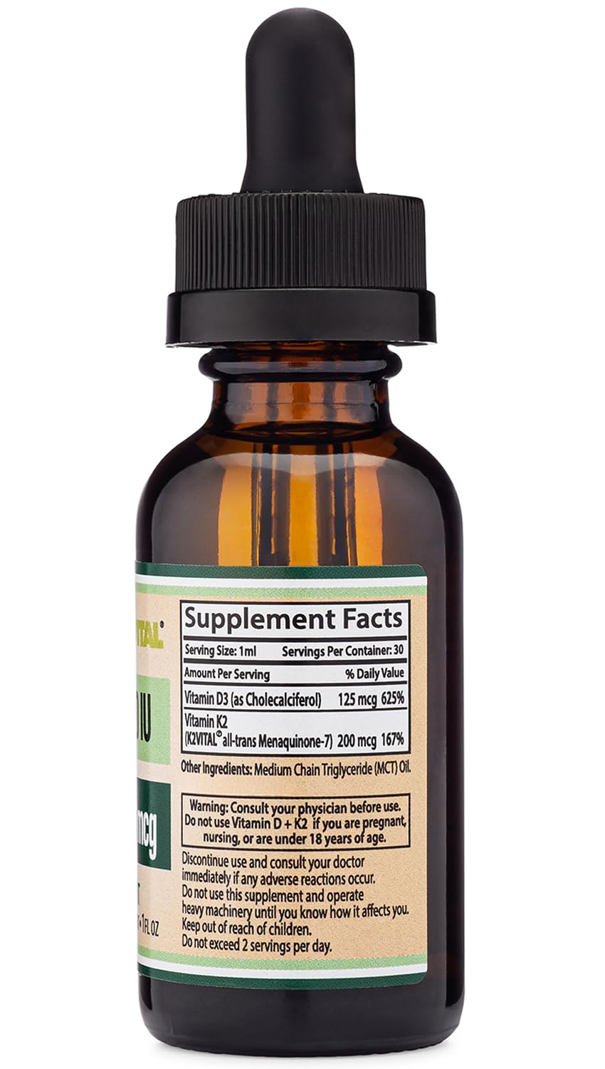 Double Wood Supplements amber dropper bottle showing Supplement Facts label vitamin D3 5000 IU with K2 drops. Double Wood Supplements amber dropper bottle showing Supplement Facts label vitamin D3 5000 IU with K2 drops.