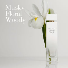 Elizabeth Arden White Tea perfume bottle with white flower and musky floral woody scent text Elizabeth Arden White Tea perfume bottle with white flower and musky floral woody scent text