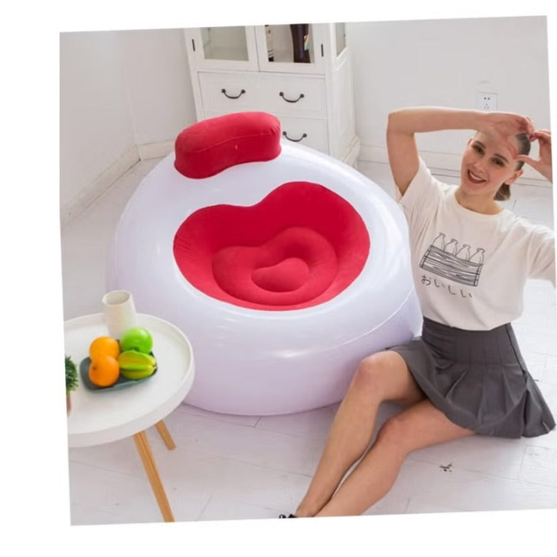 Huitich inflatable lounge chair with backrest in white and red with woman sitting beside it in living room Huitich inflatable lounge chair with backrest in white and red with woman sitting beside it in living room