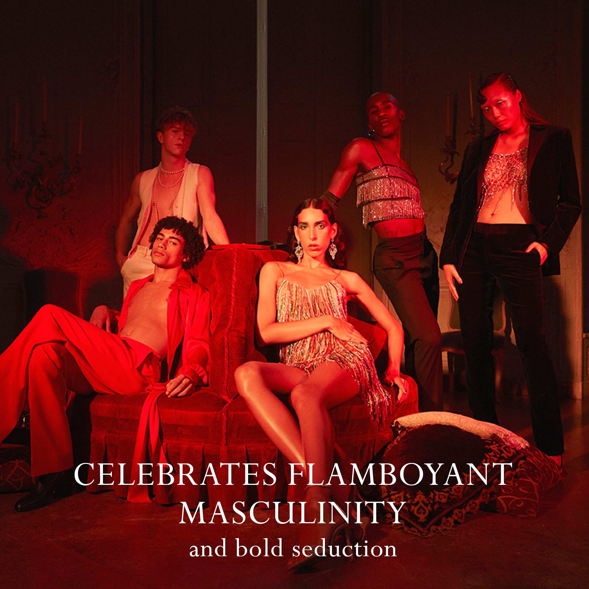 Group of stylish men and women posing in red lighting for Joop Homme perfume for men 200ml ad campaign Group of stylish men and women posing in red lighting for Joop Homme perfume for men 200ml ad campaign