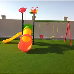 Huitich kids outdoor playset with swings and slide on a green artificial lawn Huitich kids outdoor playset with swings and slide on a green artificial lawn