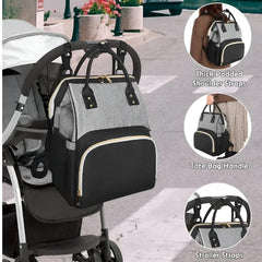Huitich modern baby travel bag in gray and black with padded shoulder straps, tote handle, and stroller straps Huitich modern baby travel bag in gray and black with padded shoulder straps, tote handle, and stroller straps