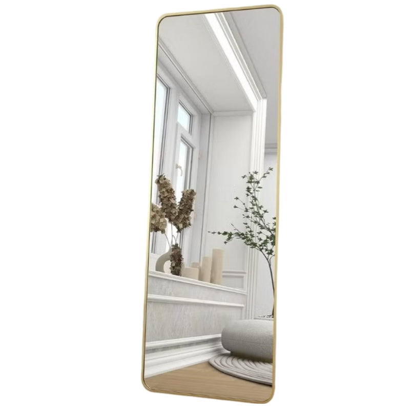 Huitich modern decorative floor mirror 145x35 with thin gold frame reflecting a bright interior space Huitich modern decorative floor mirror 145x35 with thin gold frame reflecting a bright interior space