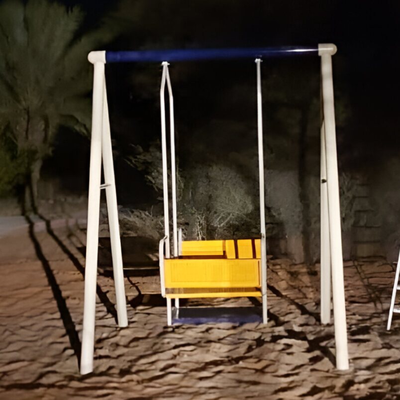 Huitich outdoor swing and slide set with yellow swing seat on white frame at night Huitich outdoor swing and slide set with yellow swing seat on white frame at night