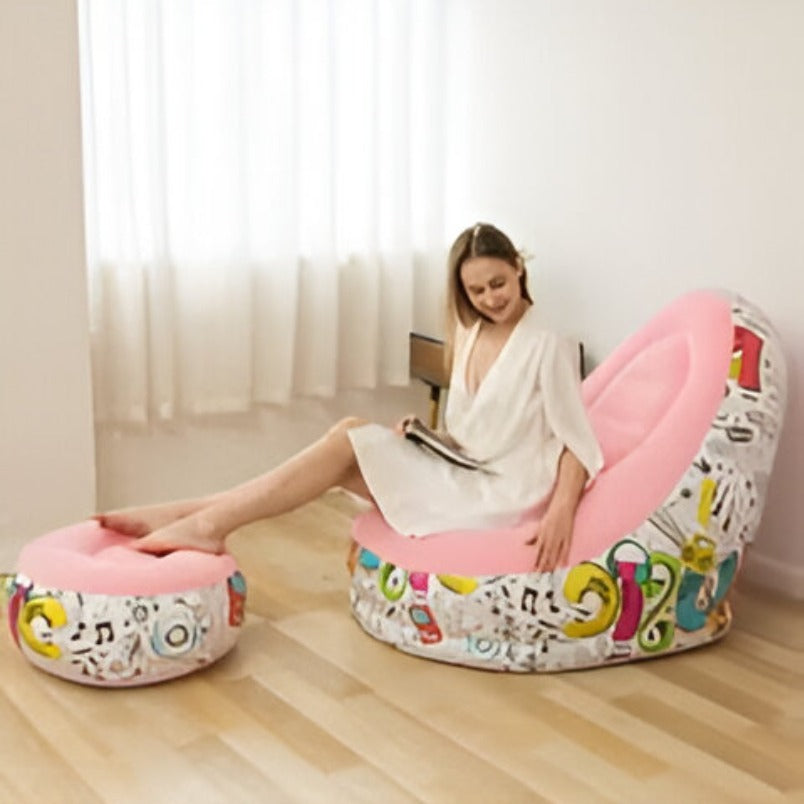 Huitich pink inflatable lounge chair with colorful base and matching footrest in a bright room Huitich pink inflatable lounge chair with colorful base and matching footrest in a bright room