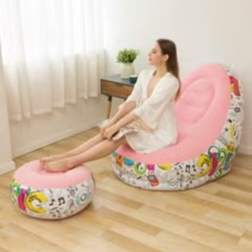 Huitich pink inflatable lounge chair with colorful base and matching footrest used in bright room Huitich pink inflatable lounge chair with colorful base and matching footrest used in bright room