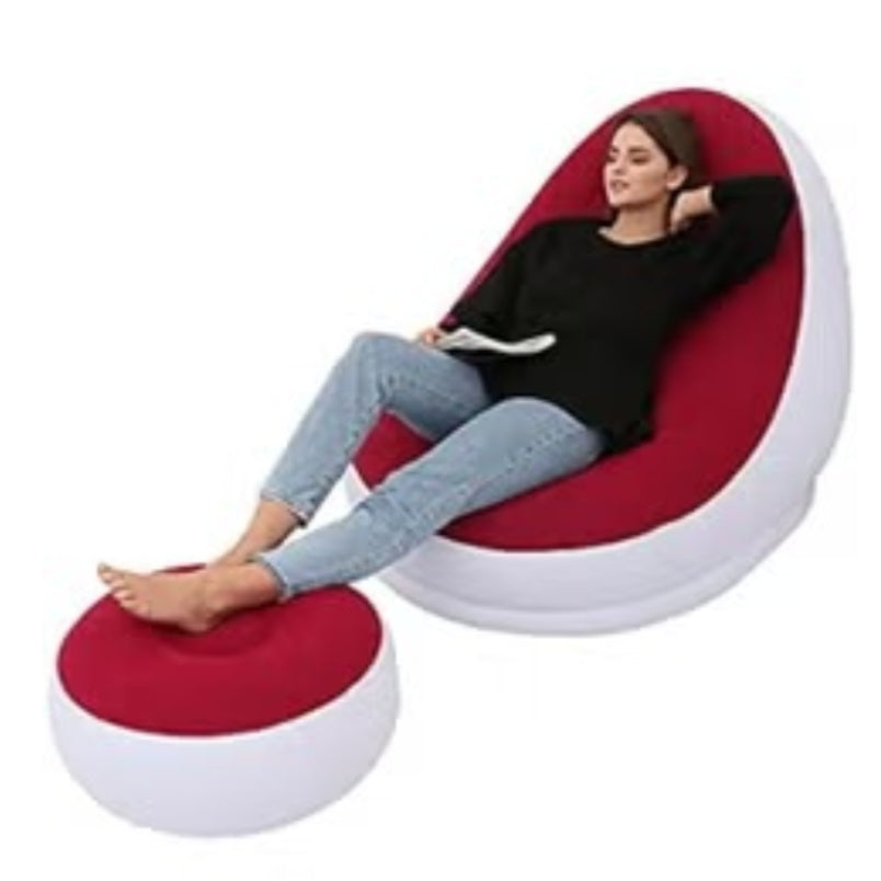 Huitich red inflatable lounge chair with matching ottoman featuring a woman relaxing comfortably Huitich red inflatable lounge chair with matching ottoman featuring a woman relaxing comfortably