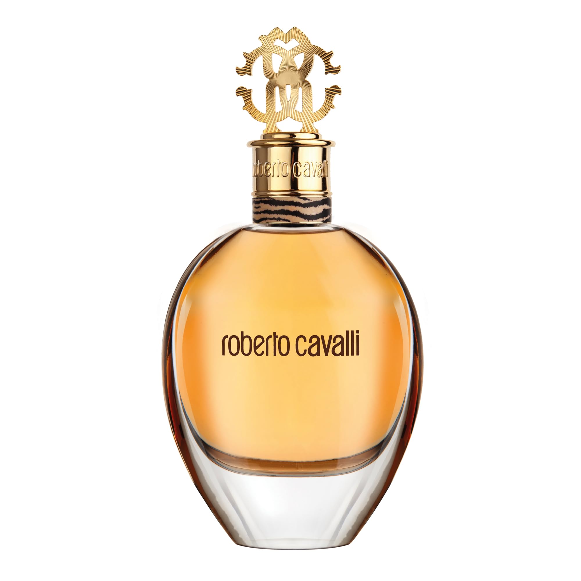 Roberto Cavalli Signature perfume bottle with golden cap and amber liquid inside Roberto Cavalli Signature perfume bottle with golden cap and amber liquid inside