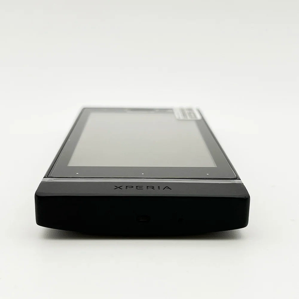 Black Sony Xperia U ST25i unlocked smartphone front edge view showing touchscreen Xperia logo and slim profile Black Sony Xperia U ST25i unlocked smartphone front edge view showing touchscreen Xperia logo and slim profile