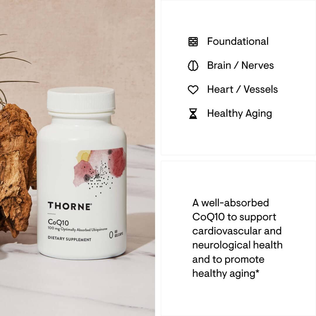 THORNE CoQ10 dietary supplement bottle on table with product info cards CoQ10 supplement for heart health THORNE CoQ10 dietary supplement bottle on table with product info cards CoQ10 supplement for heart health