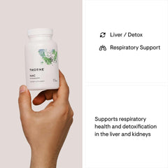 Thorne NAC supplement 500mg bottle held in hand showing liver detox and respiratory support benefits Thorne NAC supplement 500mg bottle held in hand showing liver detox and respiratory support benefits