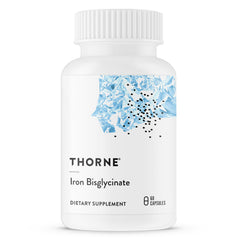 White bottle of Thorne Iron Bisglycinate supplement 60 capsules dietary supplement label White bottle of Thorne Iron Bisglycinate supplement 60 capsules dietary supplement label