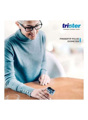 Trister fingertip pulse oximeter dual color OLED used by a woman in a cozy setting Trister fingertip pulse oximeter dual color OLED used by a woman in a cozy setting
