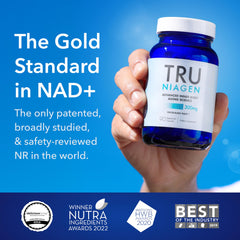 TRU NIAGEN blue supplement bottle held in hand on blue background with awards banner nicotinamide riboside capsules for energy TRU NIAGEN blue supplement bottle held in hand on blue background with awards banner nicotinamide riboside capsules for energy