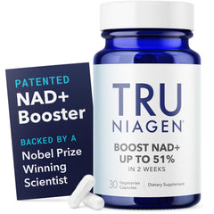 TRU NIAGEN blue bottle of nicotinamide riboside supplement 30 vegetarian capsules with two white pills TRU NIAGEN blue bottle of nicotinamide riboside supplement 30 vegetarian capsules with two white pills