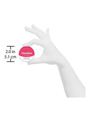 Vaseline lip therapy pink balm held in a hand, 2 inches in diameter for smooth and soft lips Vaseline lip therapy pink balm held in a hand, 2 inches in diameter for smooth and soft lips