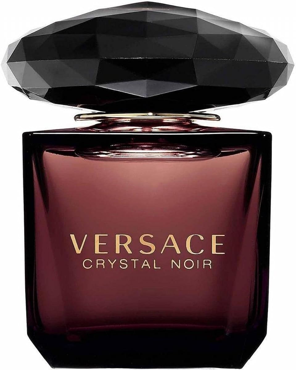 Versace Crystal Noir perfume 90ml bottle with dark purple glass and faceted black cap Versace Crystal Noir perfume 90ml bottle with dark purple glass and faceted black cap