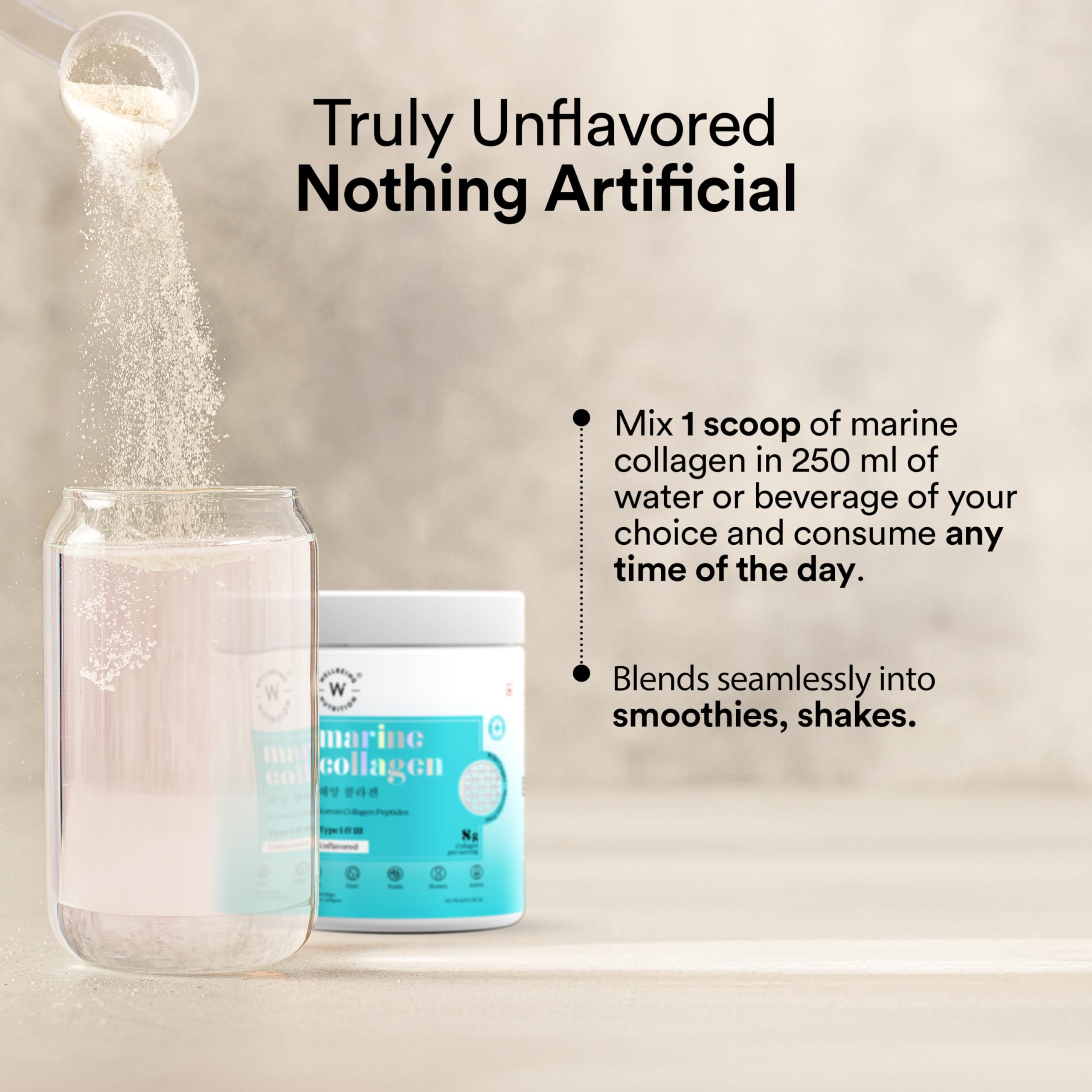 Wellbeing Nutrition Korean marine collagen powder UAE unflavored jar beside glass as scoop pours powder Wellbeing Nutrition Korean marine collagen powder UAE unflavored jar beside glass as scoop pours powder