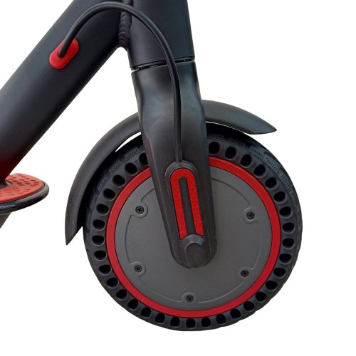 Close-up of front wheel and suspension of Winner sky 250W motor electric scooter in black and red Close-up of front wheel and suspension of Winner sky 250W motor electric scooter in black and red