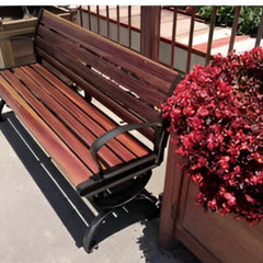 Huitich wooden patio bench 150cm with metal armrests and backrest placed outdoors near red flowers Huitich wooden patio bench 150cm with metal armrests and backrest placed outdoors near red flowers