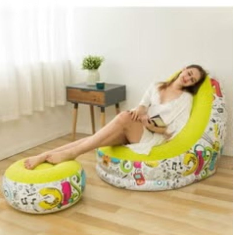 Huitich yellow graffiti bean bag chair with matching ottoman and woman relaxing indoors Huitich yellow graffiti bean bag chair with matching ottoman and woman relaxing indoors