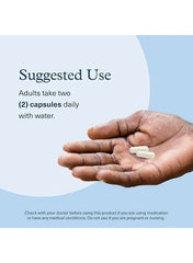 Hand holding two youtheory Ashwagandha capsules UAE with suggested use instructions Hand holding two youtheory Ashwagandha capsules UAE with suggested use instructions