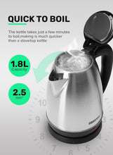 Electric tea kettle with open lid and steam, stainless body and black top