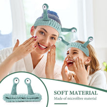 Snail-shaped teal microfiber headband worn for face washing and shower
