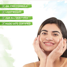 Woman applying face moisturizer, hands on cheeks; lightweight oil-free formula