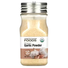 Organic garlic powder jar with screw-top lid, light tan powder inside