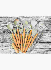 12 piece silicone kitchenware set by Huitich with wooden handles including spoons, spatulas, whisk, and tongs on wooden background