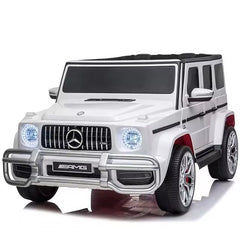 Huitich white Mercedes Benz 12V kids ride-on car with remote featuring realistic headlights and AMG detailing