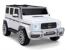 White Kids ride-on car front 3/4 view with Mercedes-Benz grille and AMG plate