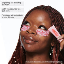 Pink patterned under-eye mask patches applied to the under-eye area