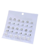 Crystal and pearl stud earring set on display card, round clear stone and pearl studs