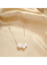 Gold tone pearl cluster pendant necklace with small white pearls on thin chain