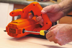 Black+Decker 1400W circular saw, orange body, exposed blade on wood