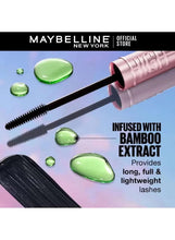 Pink mascara tube with wand brush applicator and green gel drops